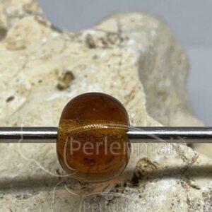 Bernsteinfarbene runde Perle