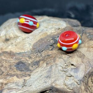 Streifenperle mit Augen gelb/türkis